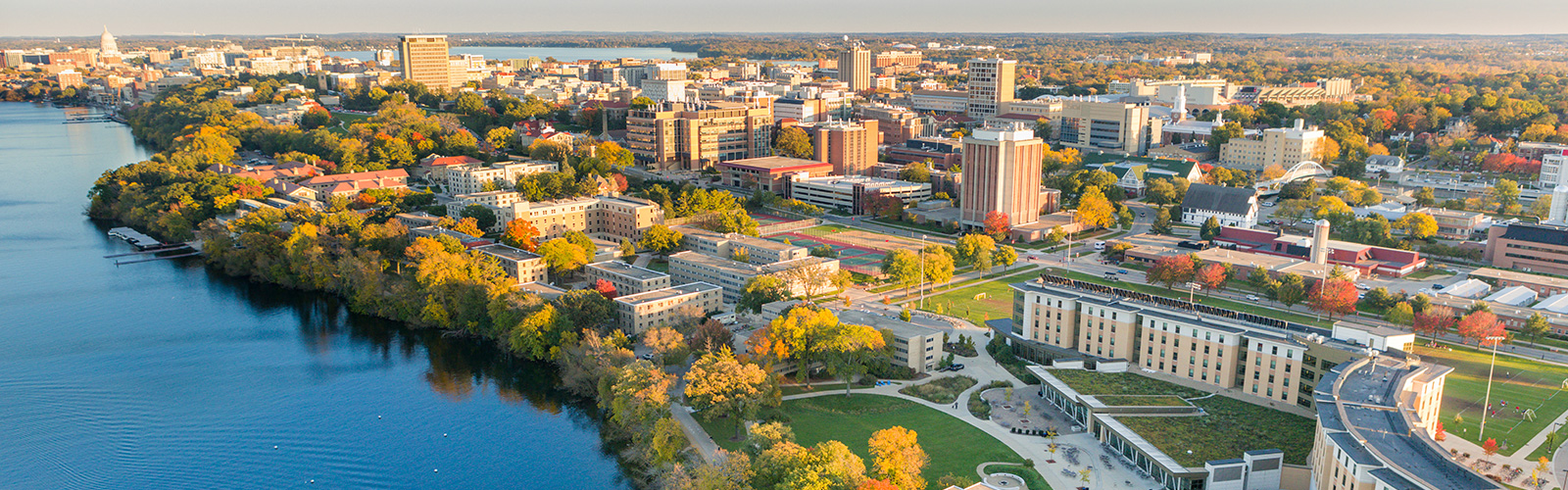 An early autumn picture of Wisconsin Madison's campus and lakeside from above.