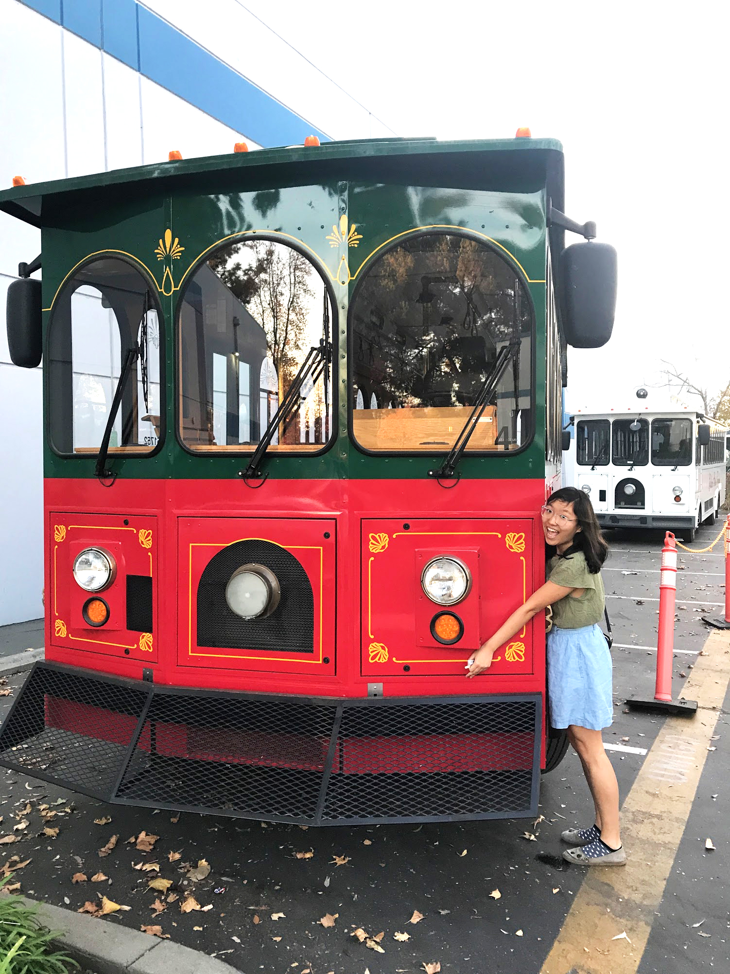 Lucy Li hugging a giant trolley